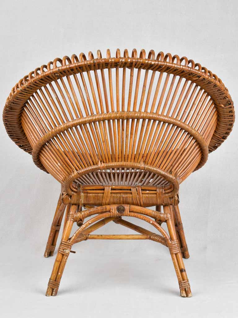 Pair of Janine Abraham wicker 'sunburst' armchairs