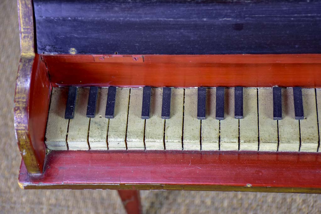 Antique small scale grand piano