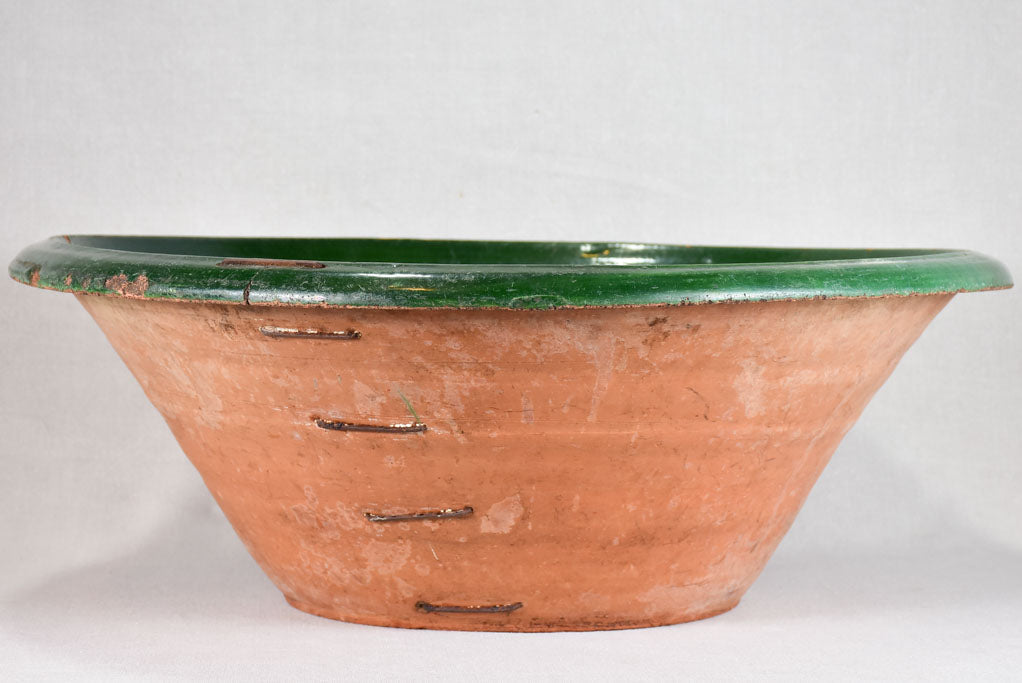 Very large antique French tian bowl with dark green glaze 28"