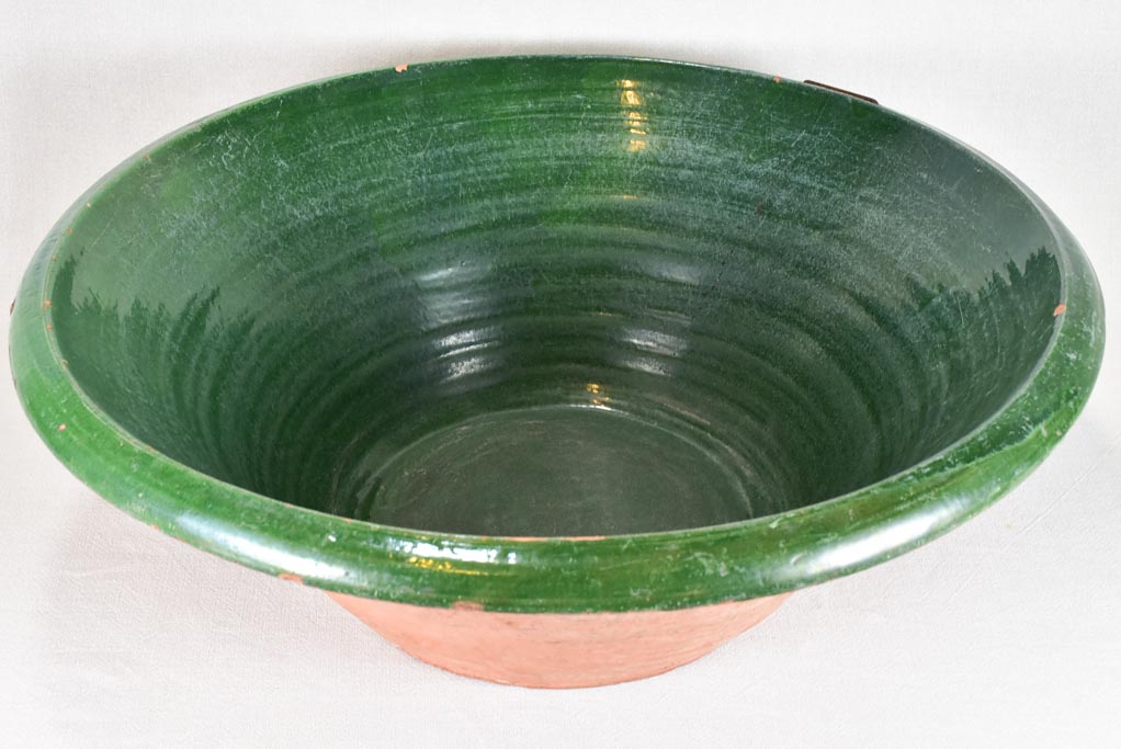 Very large antique French tian bowl with dark green glaze 28"