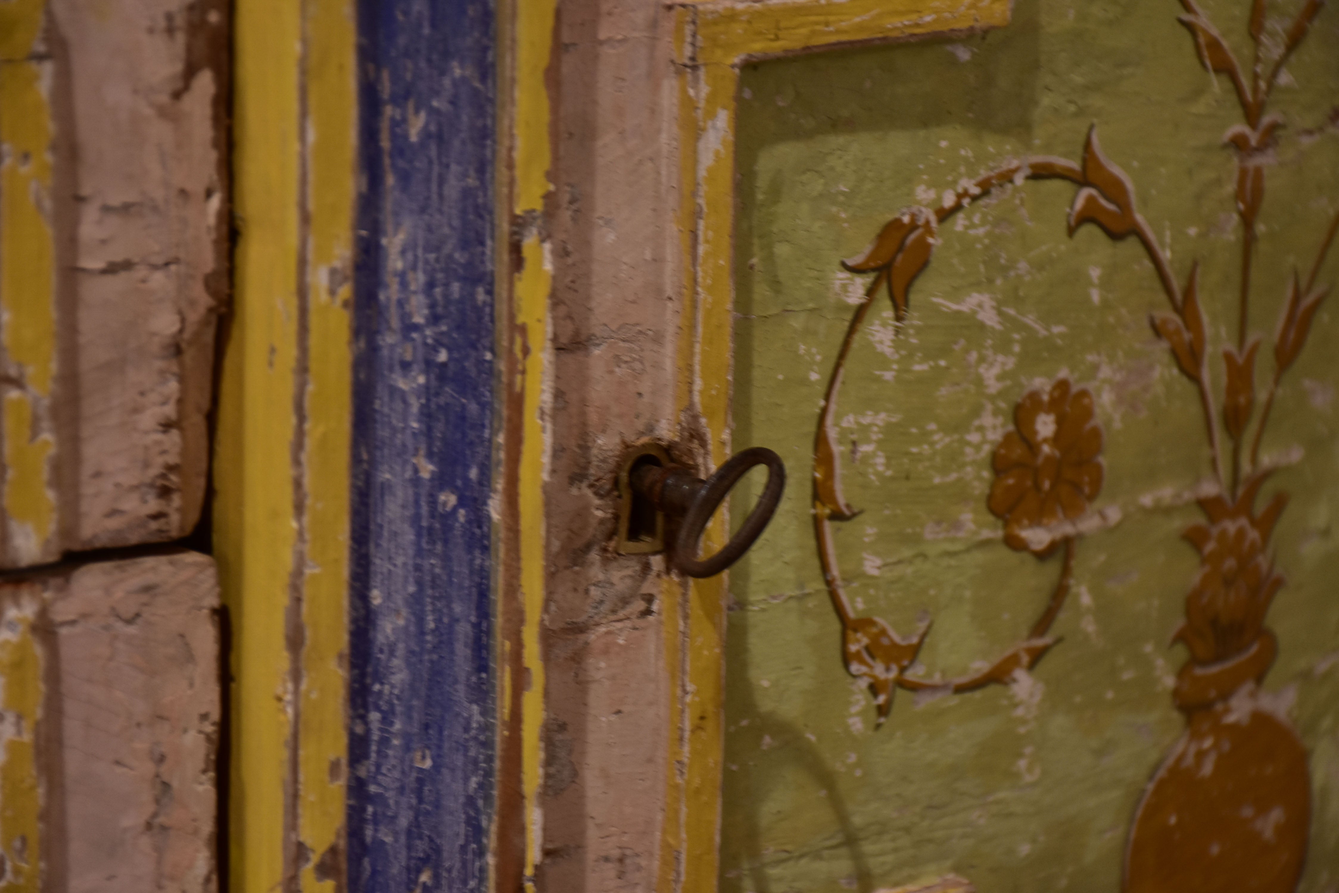 Demilune commode with pink, green, yellow and blue patina