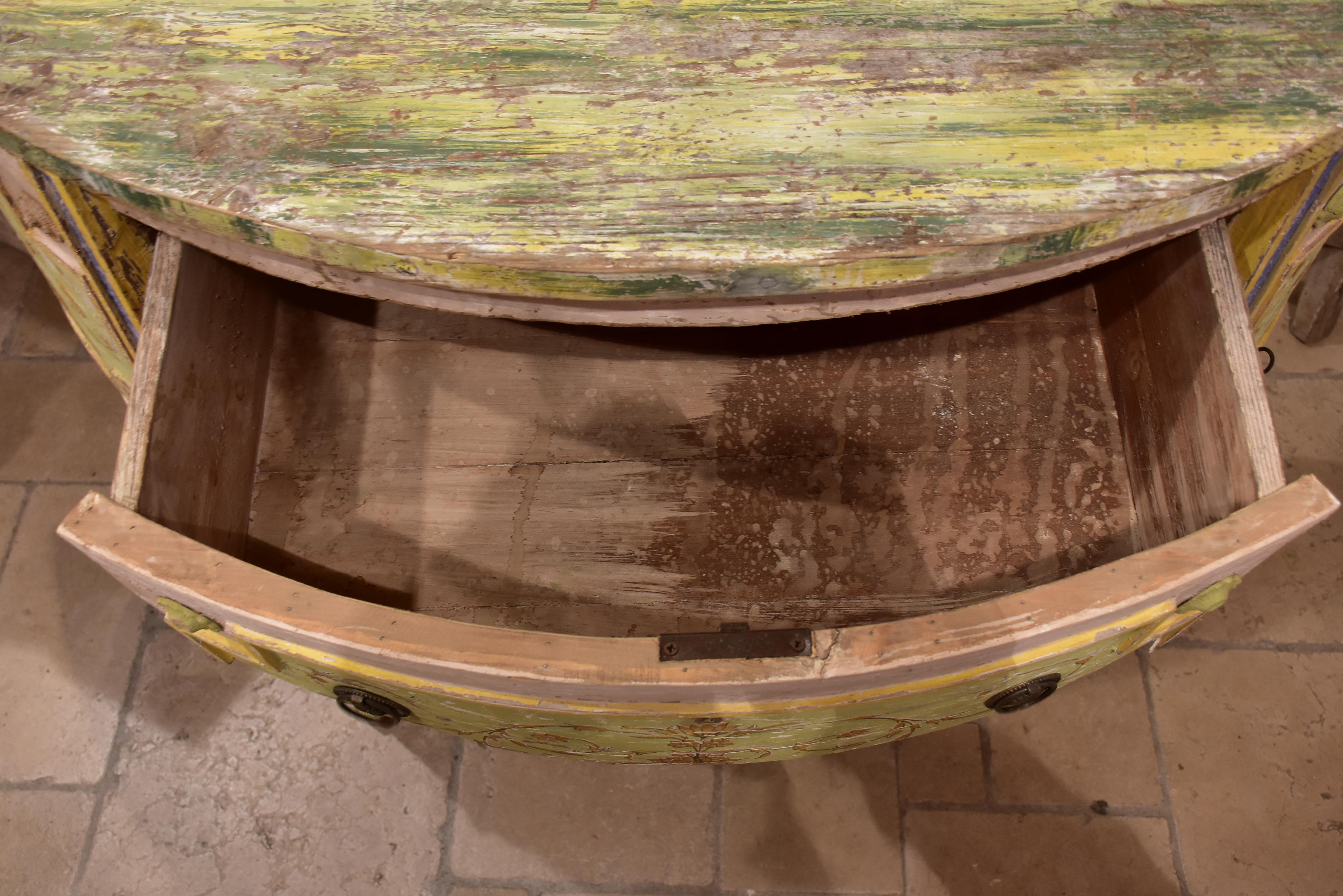Demilune commode with pink, green, yellow and blue patina