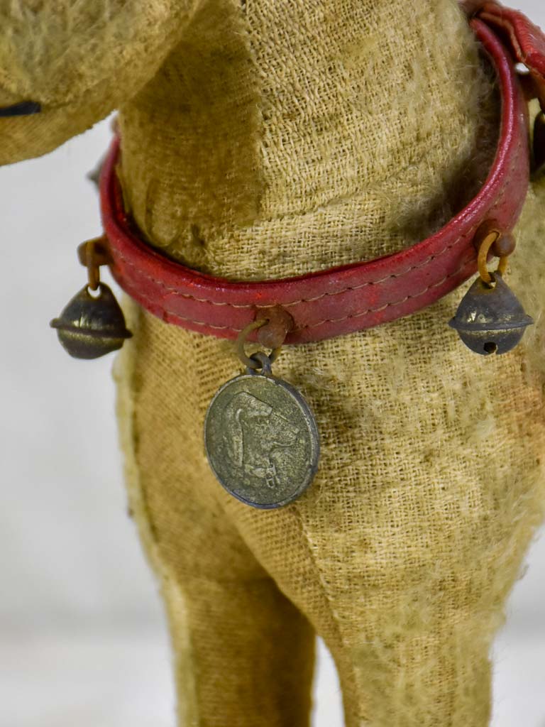 Antique French toy dog on wheels