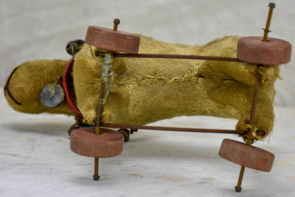 Antique French toy dog on wheels