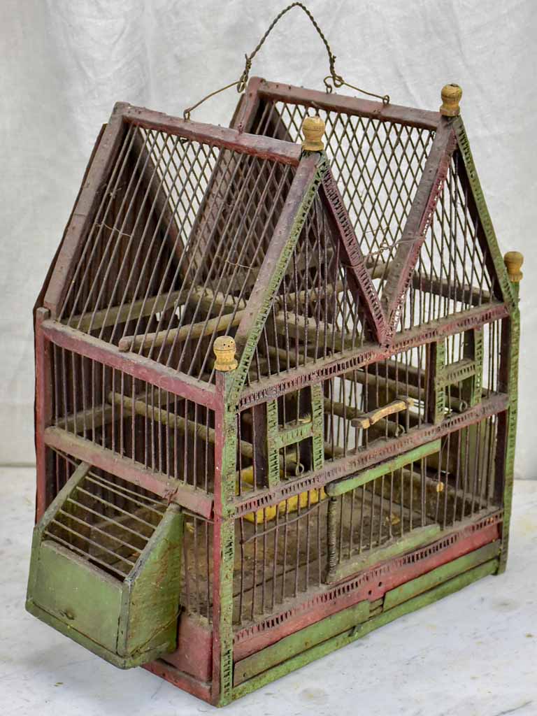Antique French birdcage with double-pitched roof