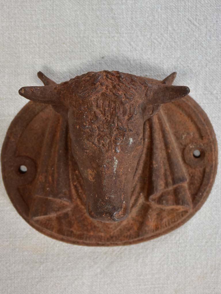 Cast iron bulls head decoration from a butcher's block 7"