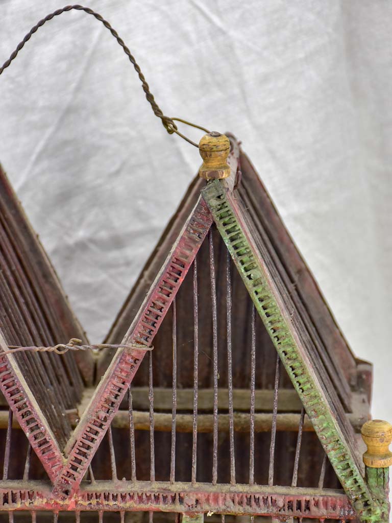 Antique French birdcage with double-pitched roof