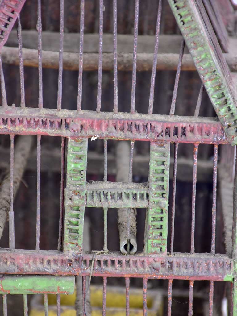 Antique French birdcage with double-pitched roof