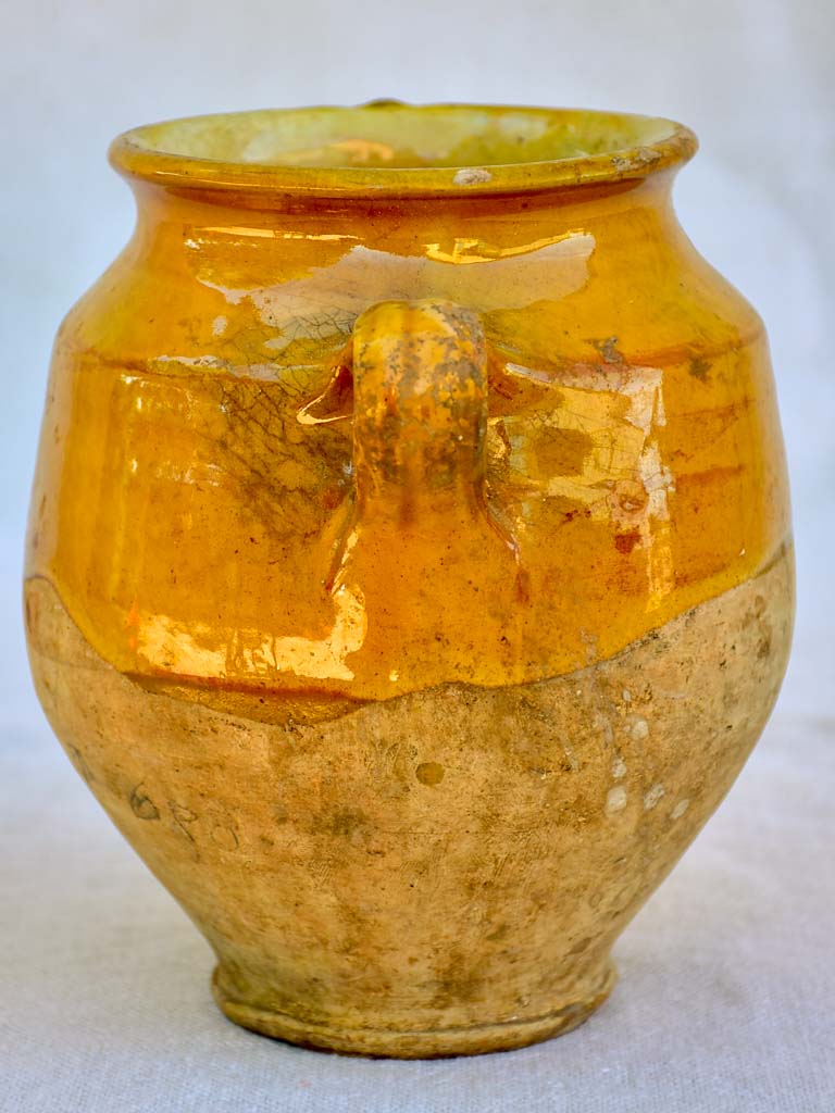 Small 19th Century French confit pot with orange glaze and a green splash 6¼"