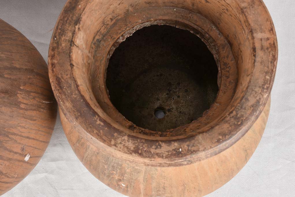 Pair of large oil jars with brown patina