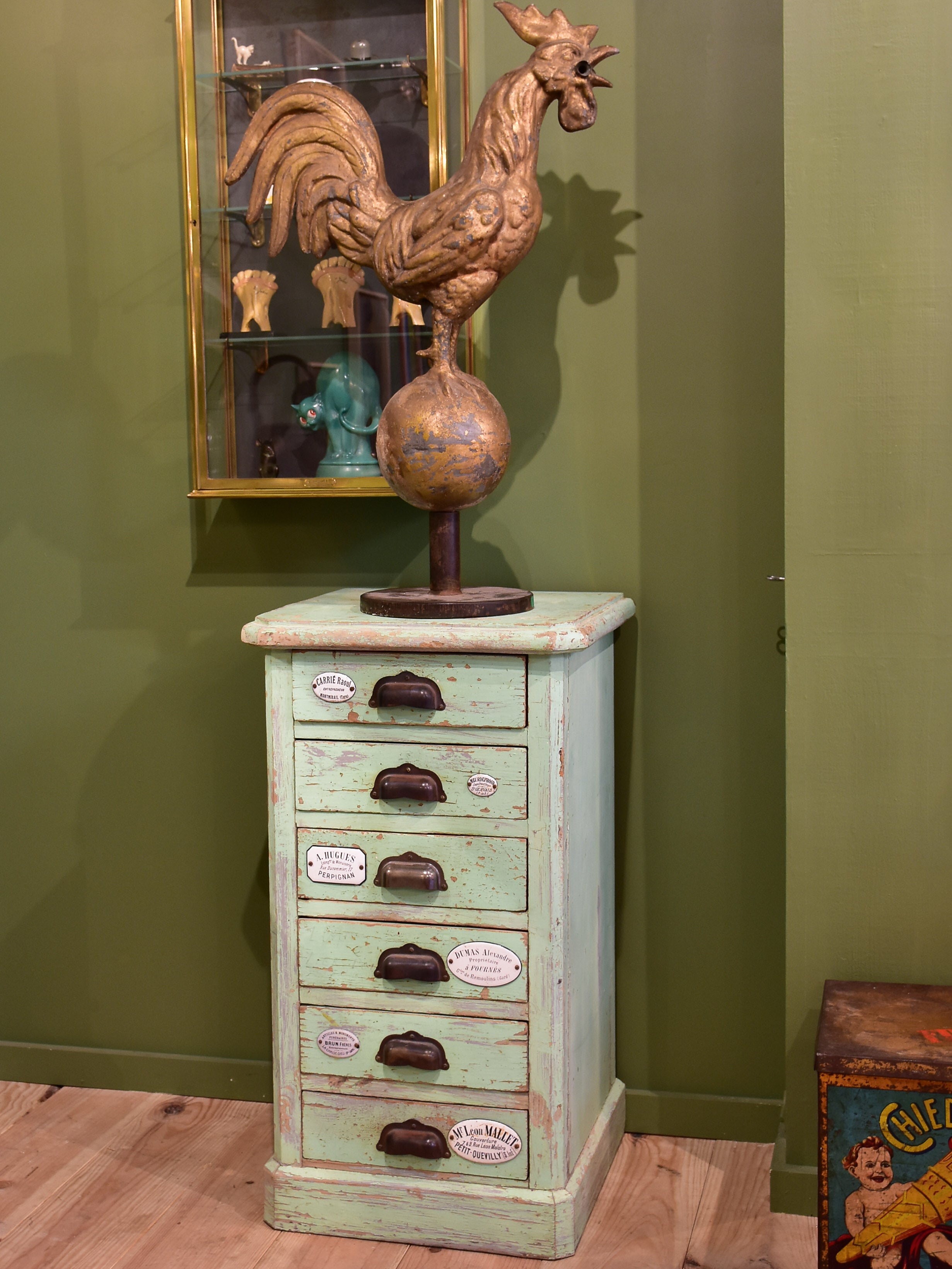 Set of small merchant's drawers with green patina