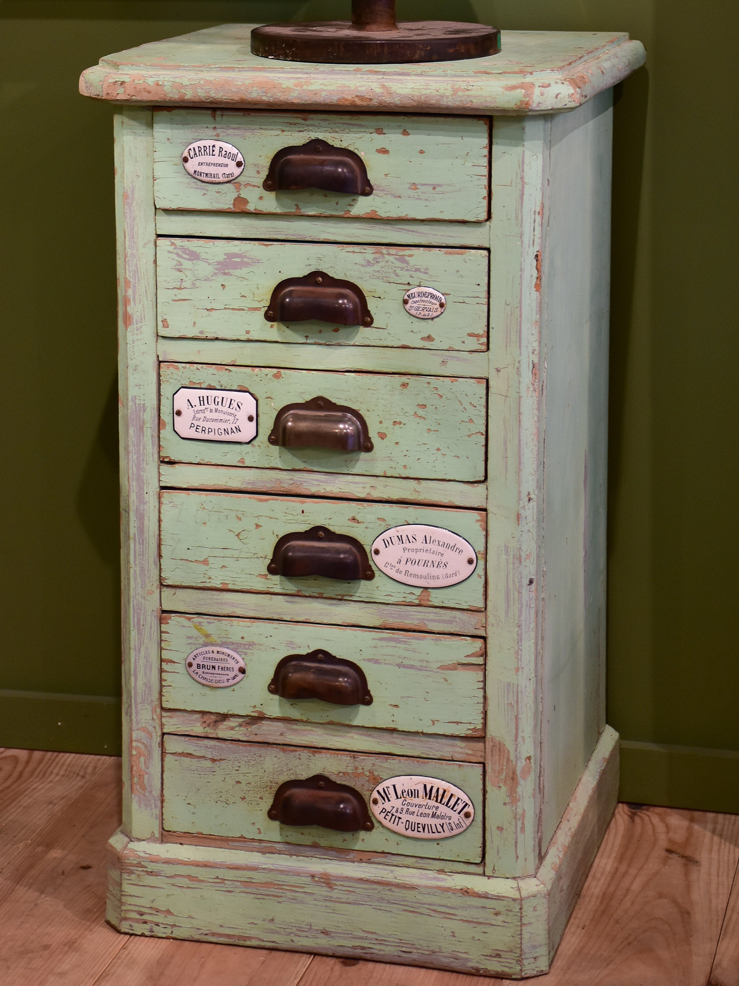 Set of small merchant's drawers with green patina
