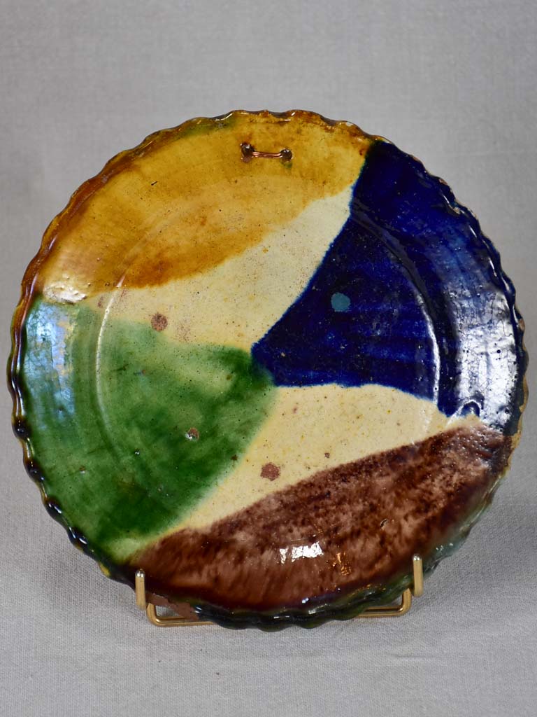 Antique French plate with brown, yellow, blue, and green glaze 9¾"