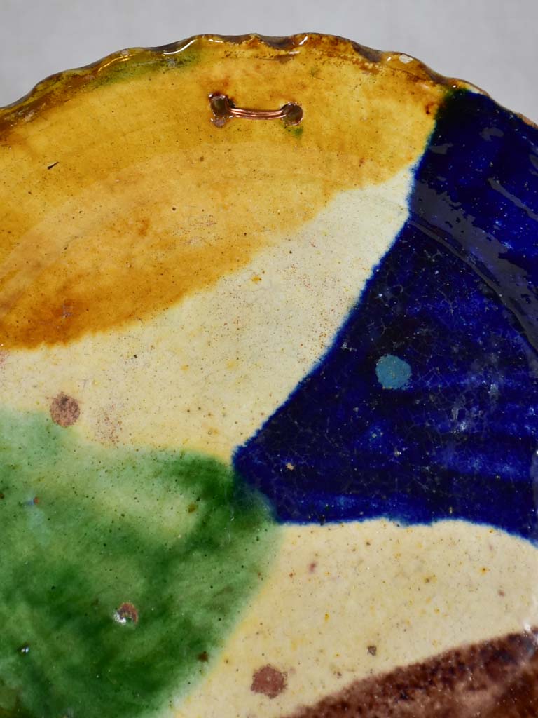 Antique French plate with brown, yellow, blue, and green glaze 9¾"