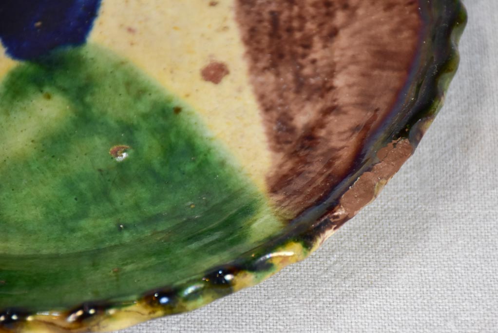 Antique French plate with brown, yellow, blue, and green glaze 9¾"