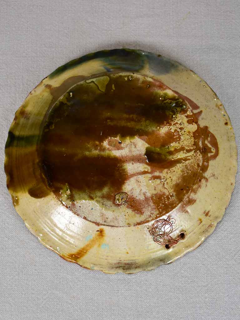 Antique French plate with brown, yellow, blue, and green glaze 9¾"