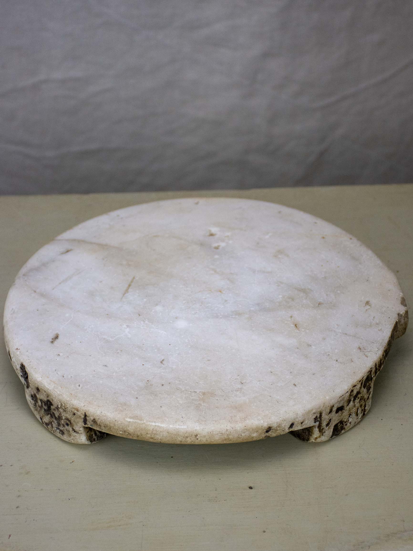 Antique marble footed trivet