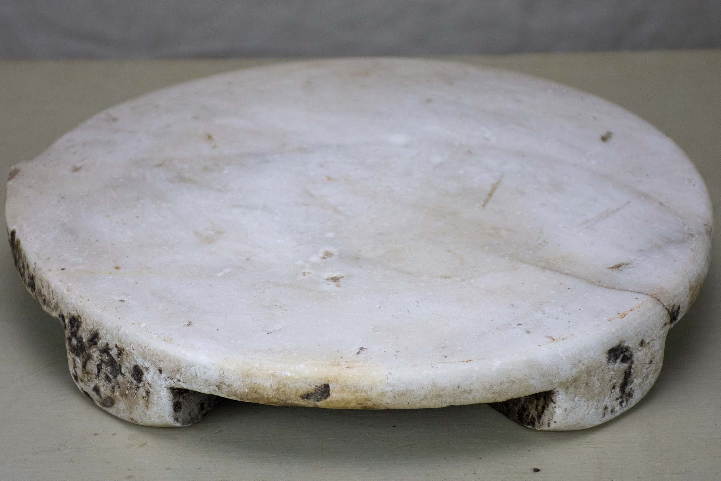 Antique marble footed trivet
