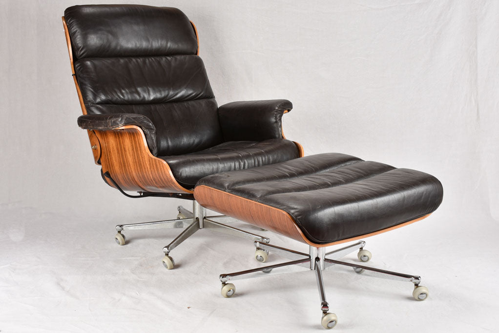 1960s Giroflex / Martin Stoll black leather armchair and footrest