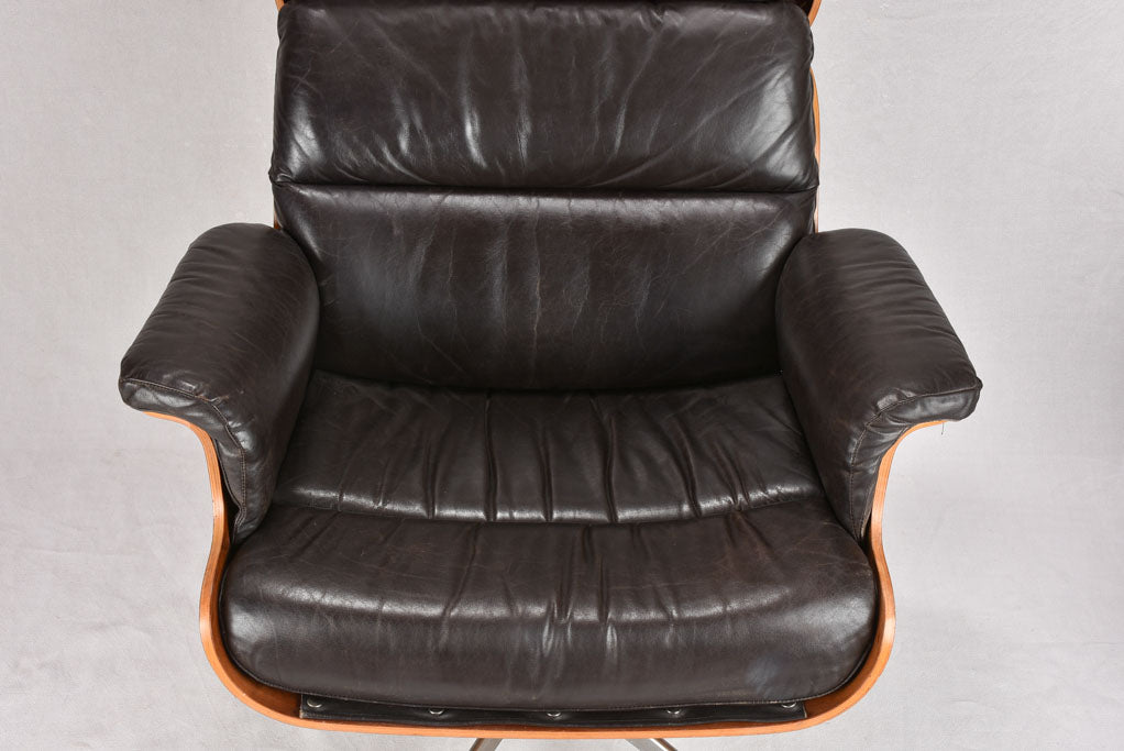 1960s Giroflex / Martin Stoll black leather armchair and footrest