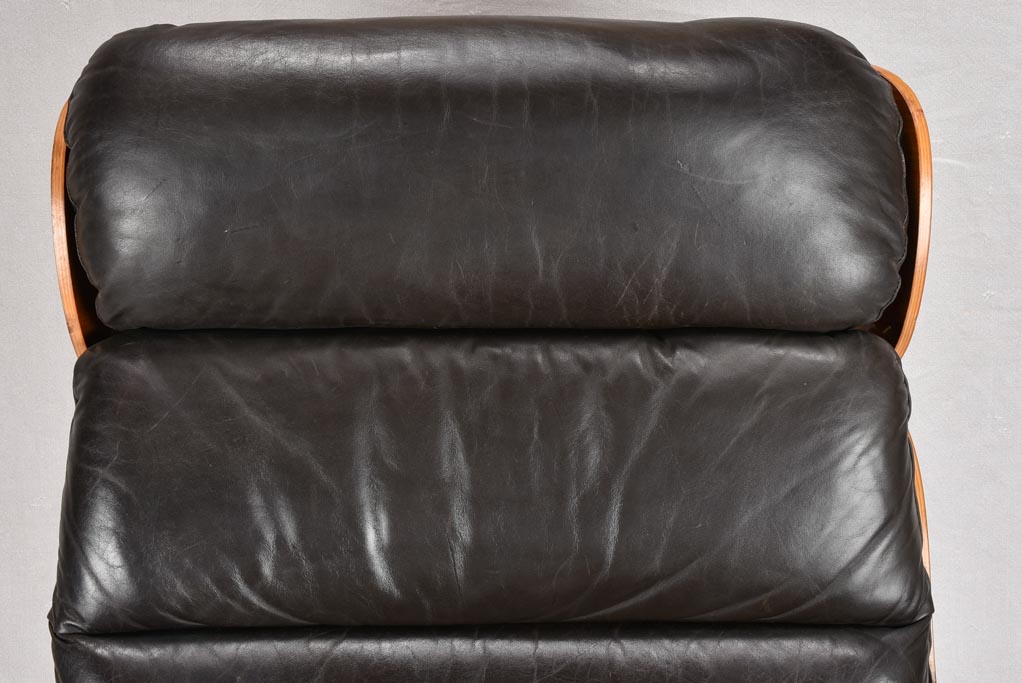 1960s Giroflex / Martin Stoll black leather armchair and footrest