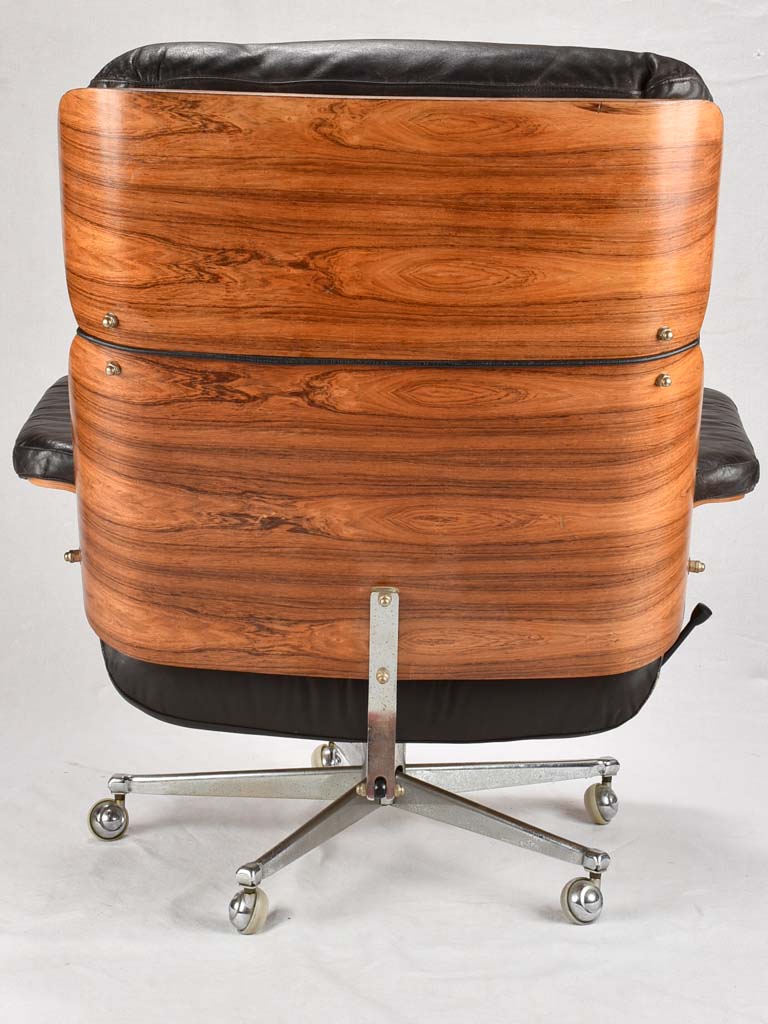 1960s Giroflex / Martin Stoll black leather armchair and footrest
