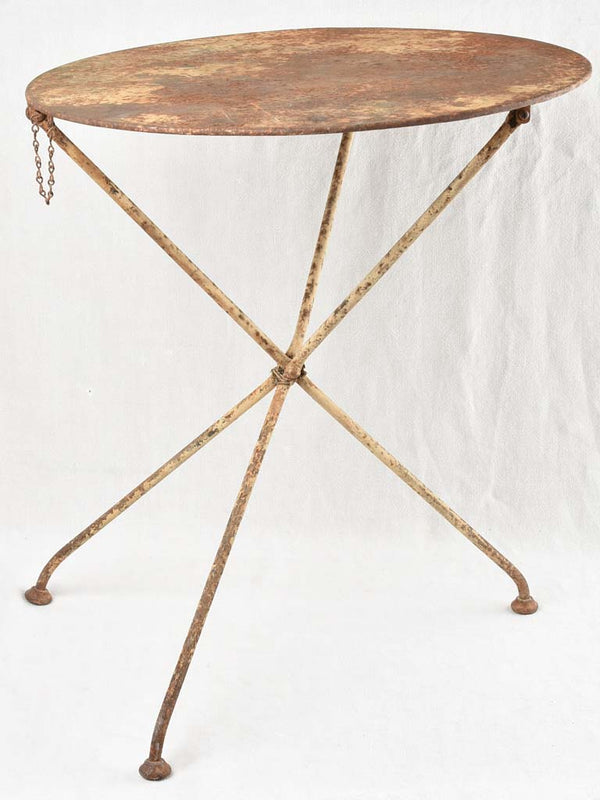 Antique rustic French iron garden table