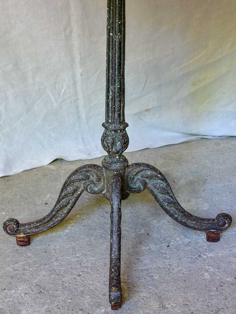 Late 19th Century round French table with marble top and cast iron base 31"