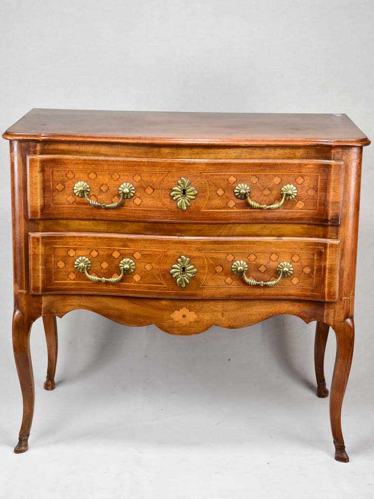Antique French marquetry sauteuse commode with hoof feet