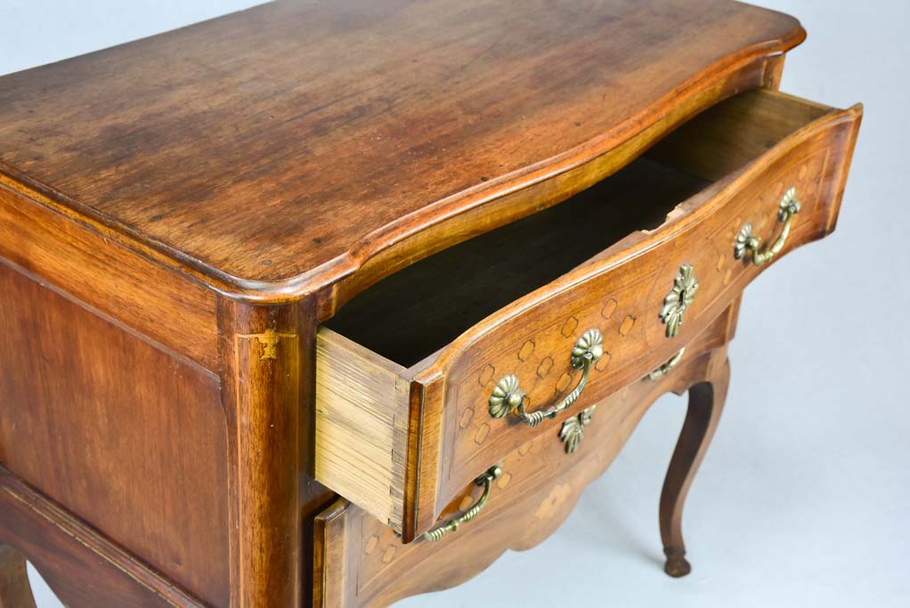 Antique French marquetry sauteuse commode with hoof feet