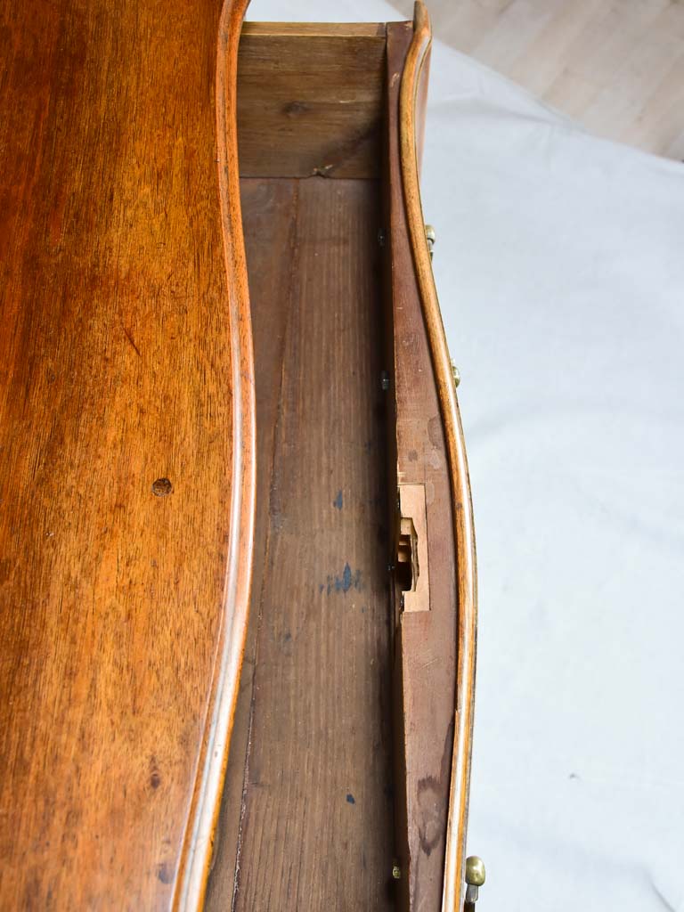 Antique French marquetry sauteuse commode with hoof feet
