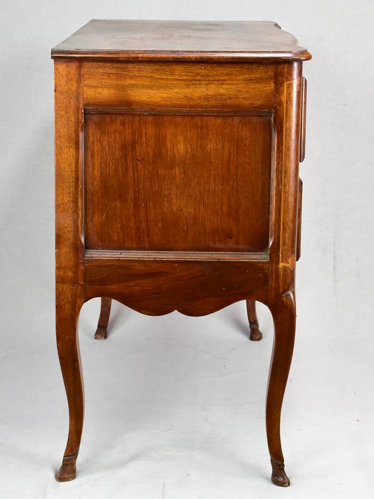 Antique French marquetry sauteuse commode with hoof feet