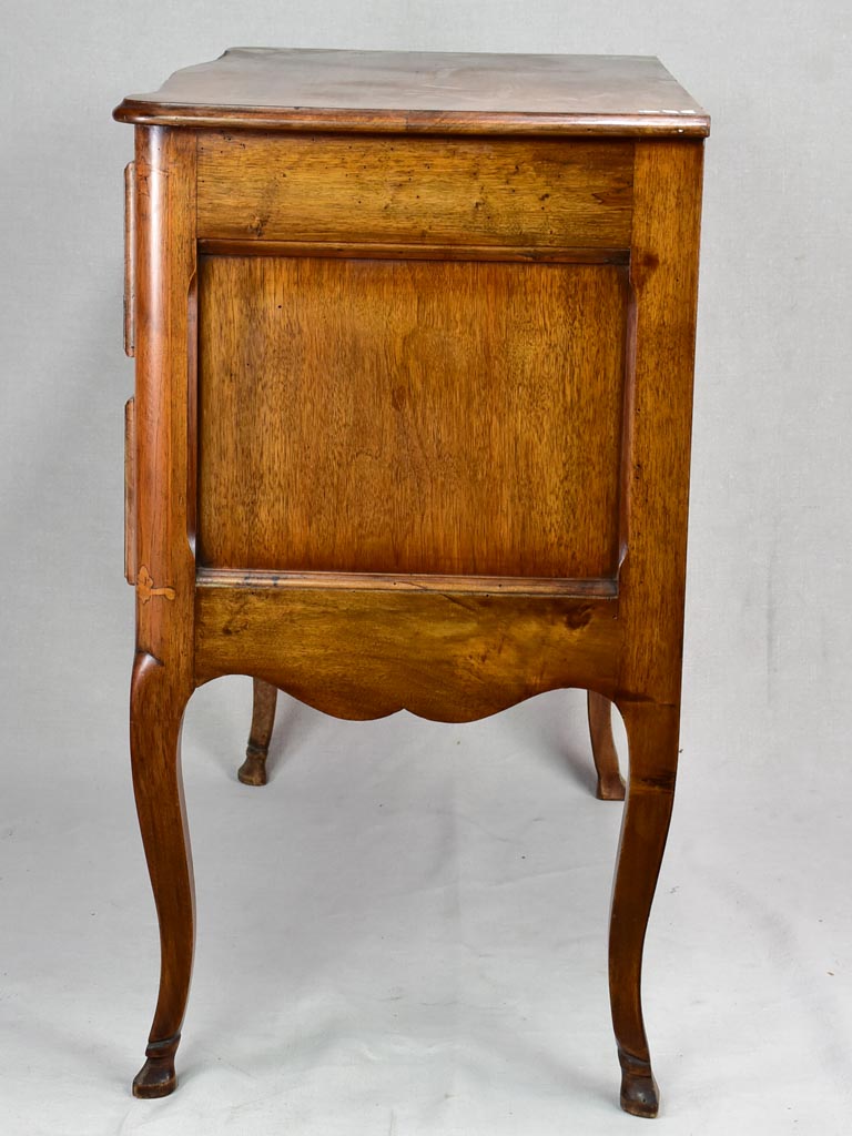 Antique French marquetry sauteuse commode with hoof feet