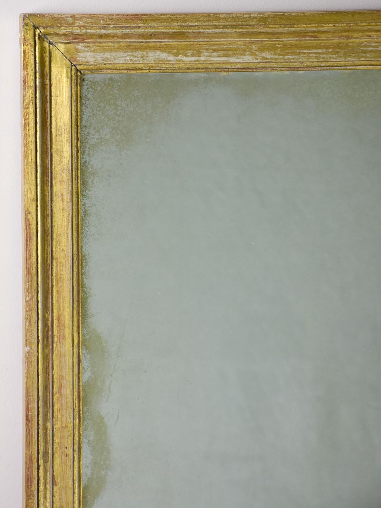 Early 20th Century French rectangular mirror with gold frame 19¾" x 44"
