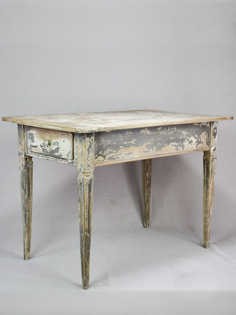 Late eighteenth-century Louis XVI French desk / table with tapered legs and drawer