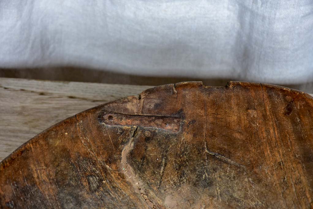 Antique primitive raised wooden bowl