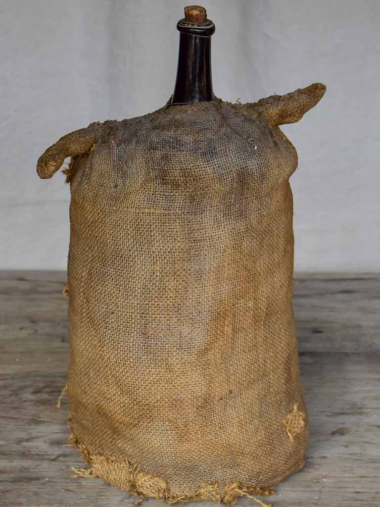 Antique French carboy in jute