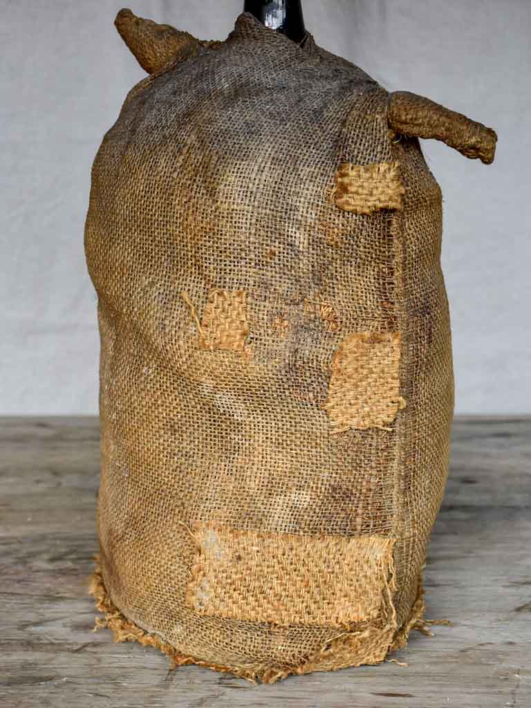 Antique French carboy in jute