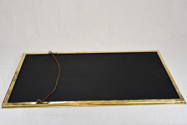 Early twentieth-century French menu chalkboard with brass frame 17¾" x 31½"
