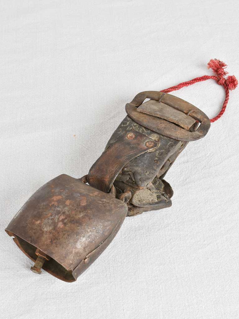 Antique French cowbell with leather collar