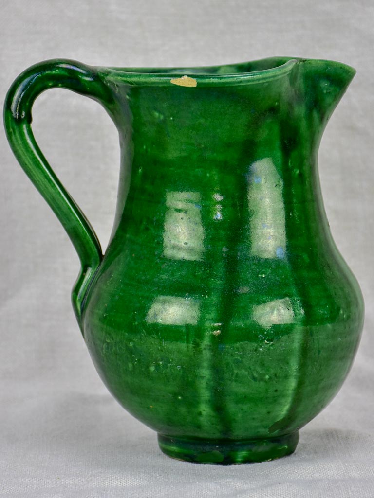 Antique French water pitcher with green glaze