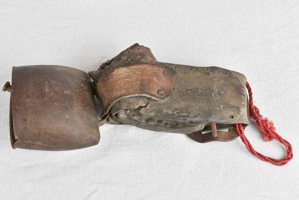 Antique French cowbell with leather collar