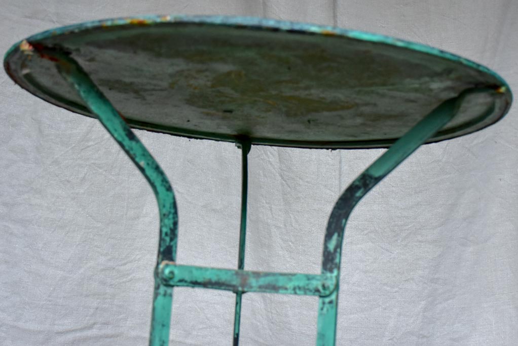 Small early 20th Century French garden table with blue patina