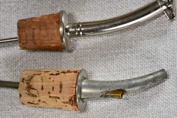 Three spirit pourers from the early twentieth century