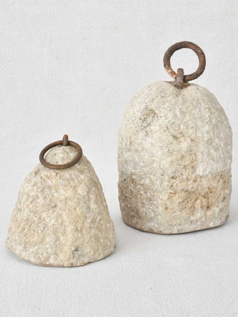 Two antique stone counterweights 6¼"