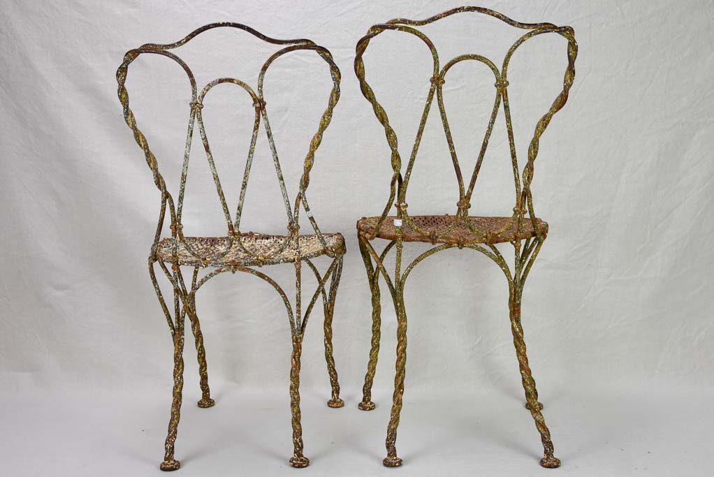 Pair of pretty 19th century French garden chairs with twisted iron frames