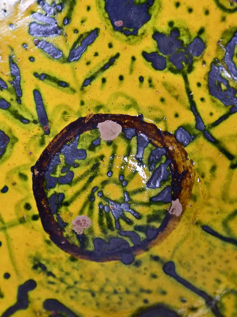 Antique folk art terracotta bowl with yellow glaze 11½"