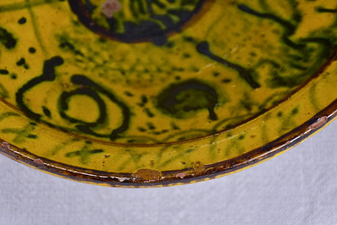 Antique folk art terracotta bowl with yellow glaze 11½"