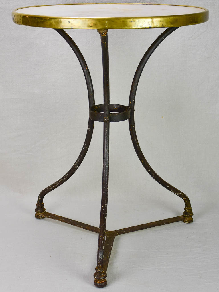 Marble top bistro table with iron base from the 1900's