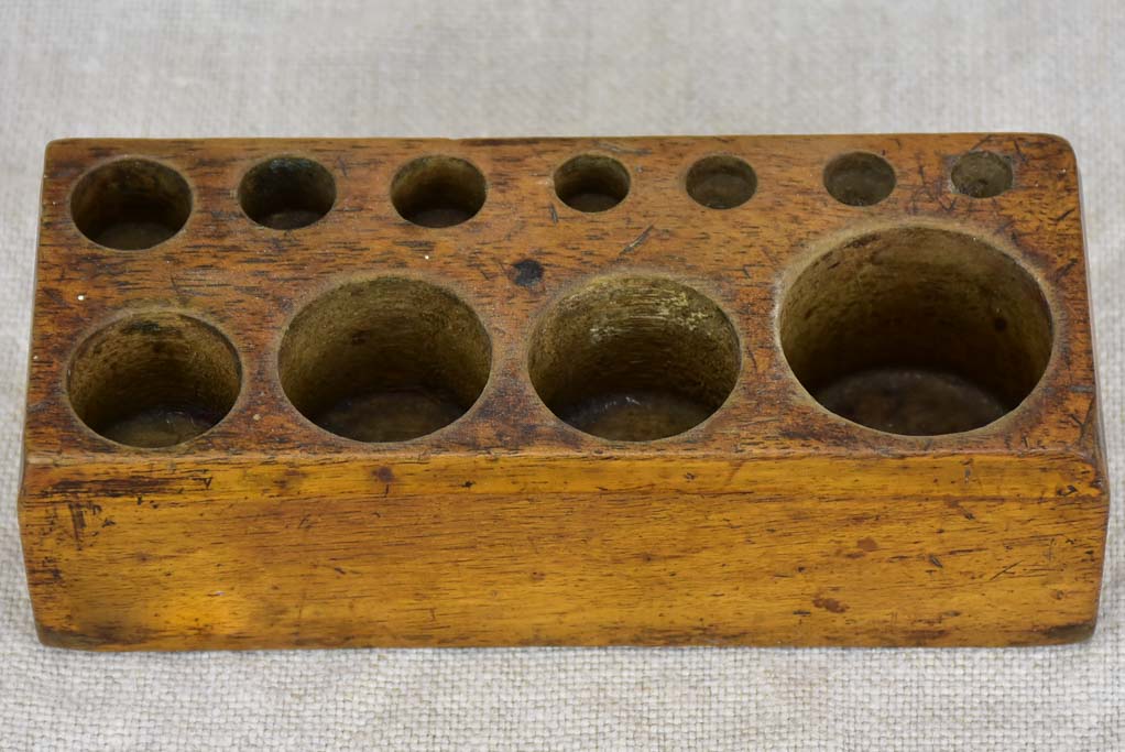 Set of eleven antique French weights for scales - 1-200g